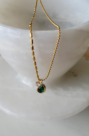 HALF AND HALF NECKLACE WITH EMERALD PENDANT
